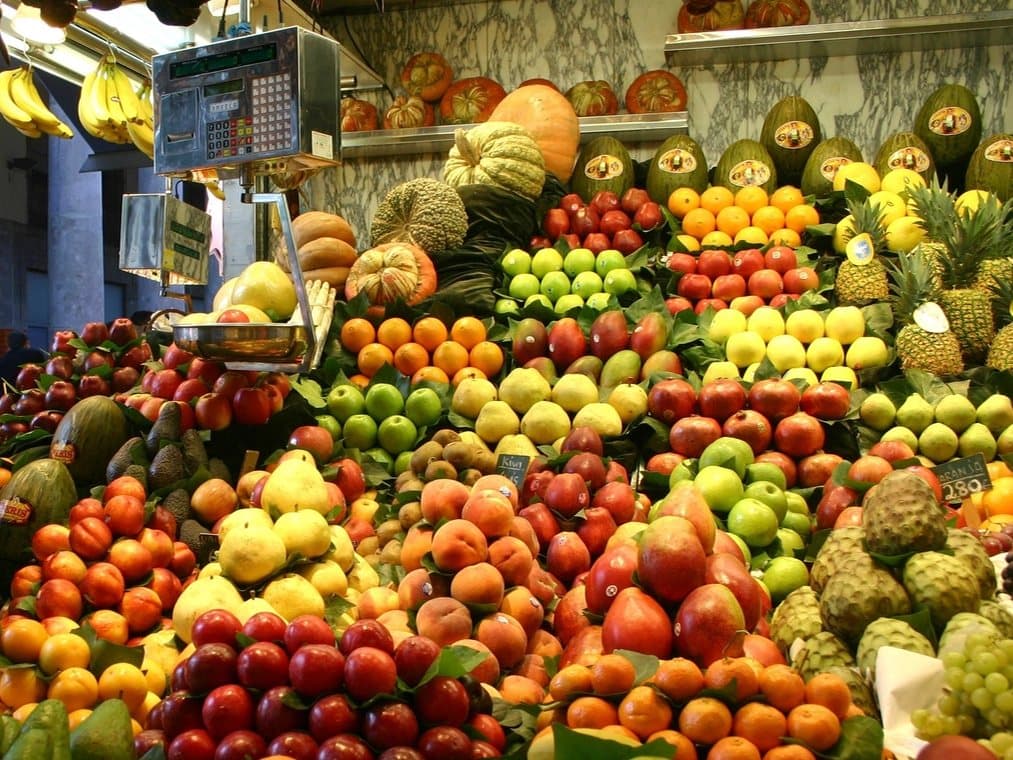 Colourful fresh fruits stacked at a local fruit stall